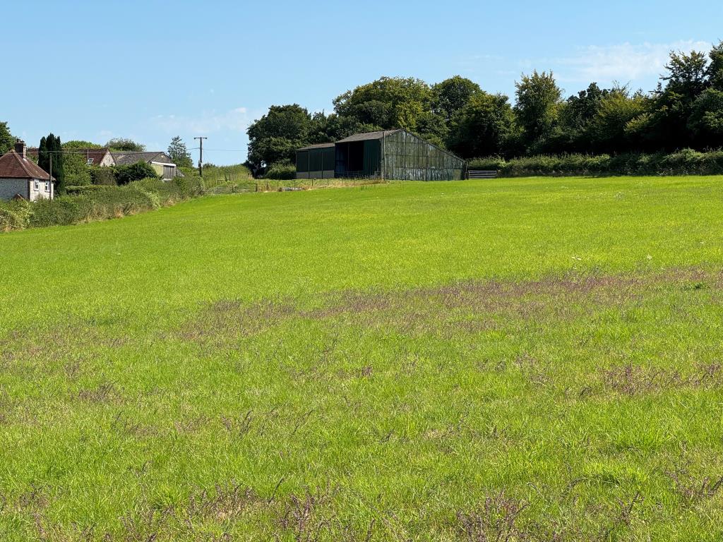 Lot: 75 - FARM BUILDINGS WITH POTENTIAL AND SIX ACRES IN A BEAUTIFUL RURAL SETTING - The Farm Buildings and Entrance Looking Back From The Land